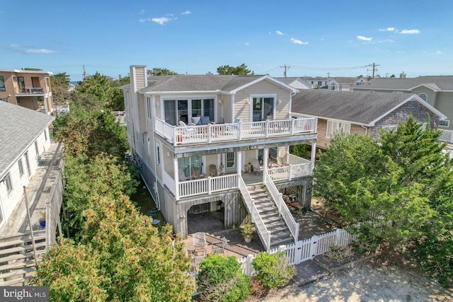 view of front of home with a balcony