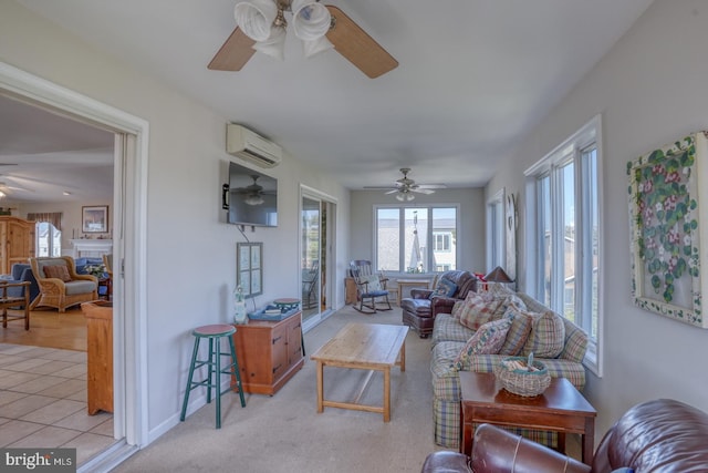 living room with an AC wall unit, light colored carpet, and ceiling fan