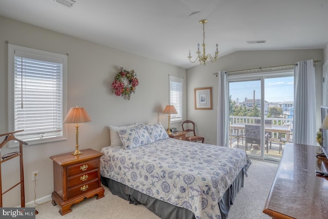 bedroom featuring access to outside, vaulted ceiling, carpet, and multiple windows