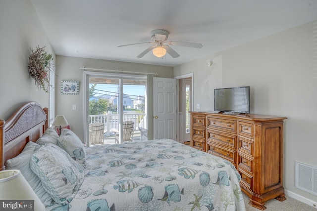 carpeted bedroom with ceiling fan and access to outside