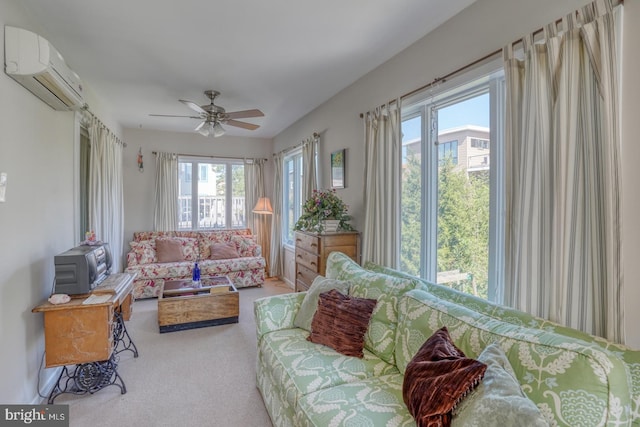 sunroom / solarium with ceiling fan and an AC wall unit