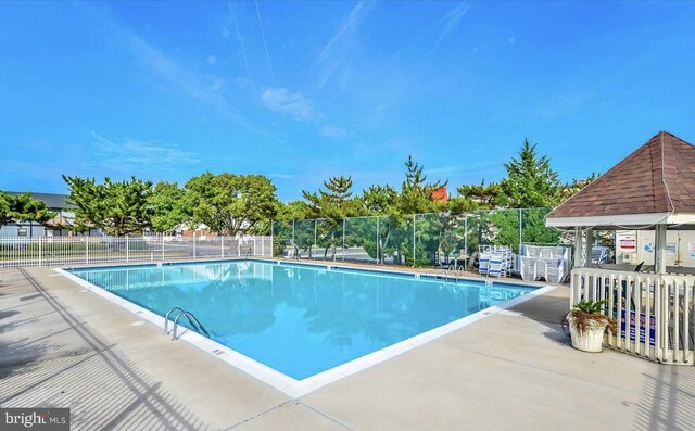 view of pool with a patio