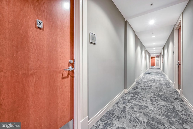 corridor with carpet floors