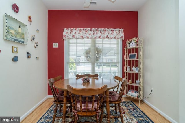 dining room featuring wood-type flooring