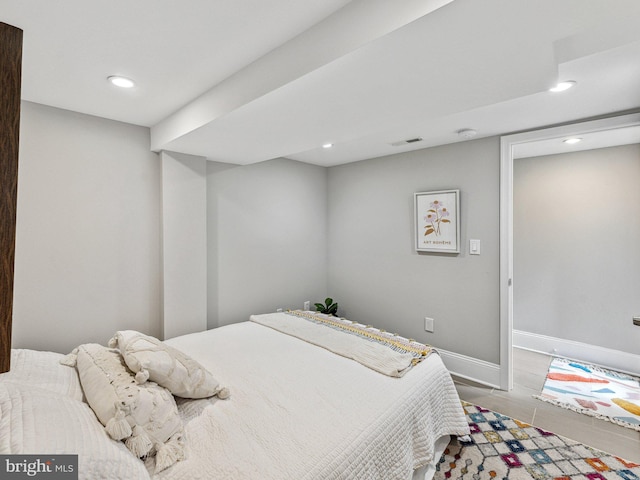 bedroom featuring hardwood / wood-style flooring