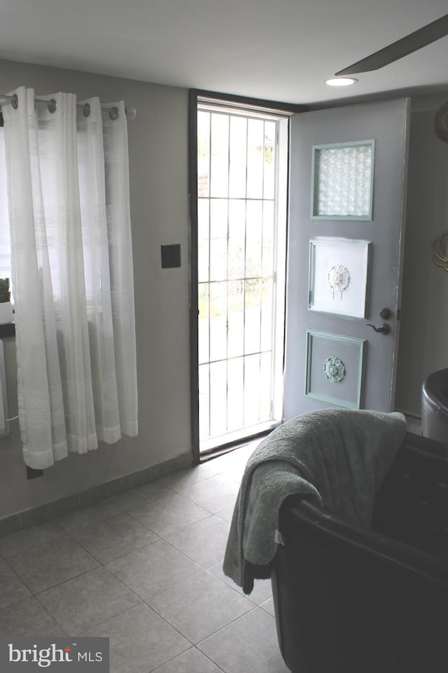 interior space featuring light tile patterned flooring