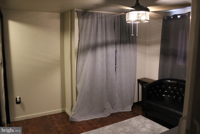 bathroom with hardwood / wood-style flooring