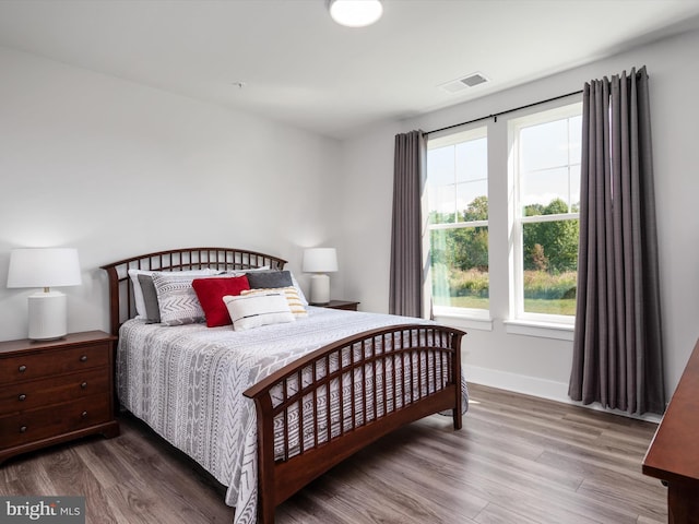 bedroom featuring wood-type flooring