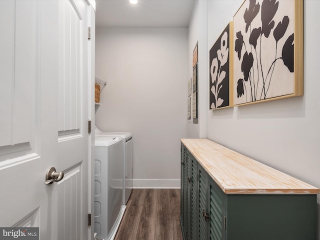 laundry area featuring independent washer and dryer and dark hardwood / wood-style floors