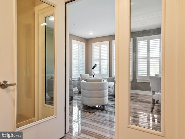 doorway with hardwood / wood-style flooring