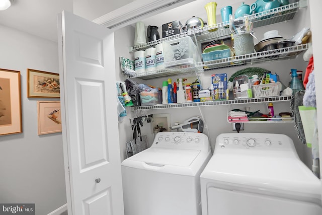 laundry area with washer and clothes dryer