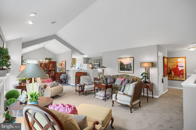 living room featuring a notable chandelier, vaulted ceiling, and light colored carpet