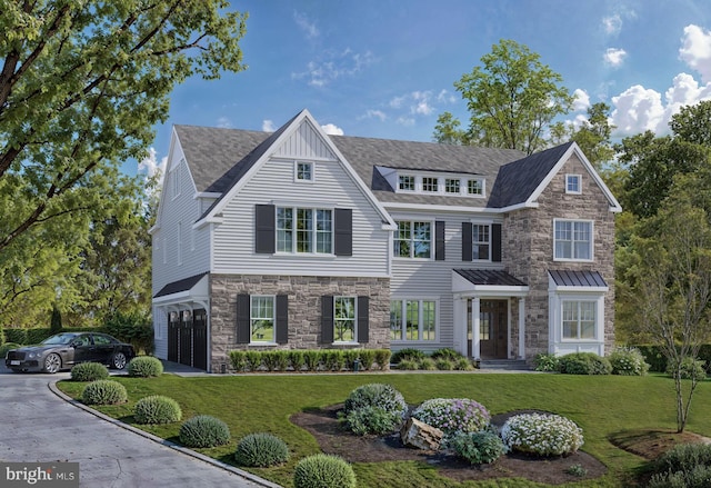 view of front of property featuring a front yard