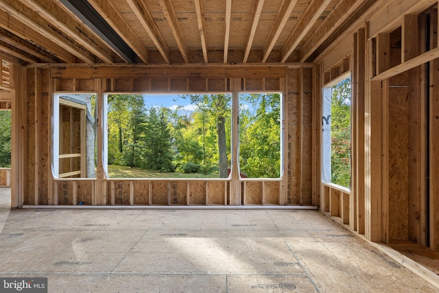 unfurnished sunroom featuring a wealth of natural light