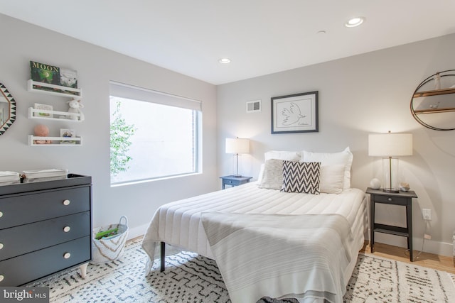 bedroom featuring light hardwood / wood-style floors