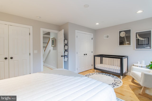 bedroom with light hardwood / wood-style floors