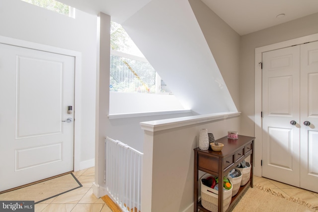 tiled entrance foyer with radiator