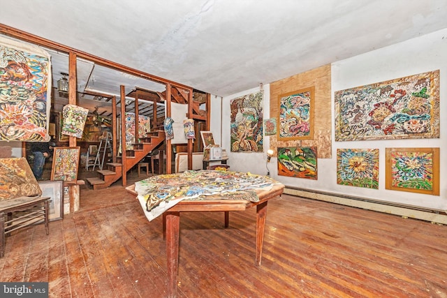 6753 Dickerson Rd, Dickerson, MD 20842 - living area with baseboard heating, stairs, and hardwood / wood-style flooring