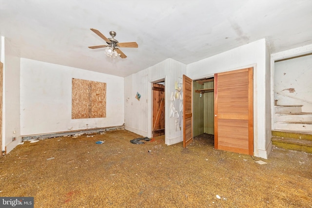 unfurnished bedroom with a closet and ceiling fan