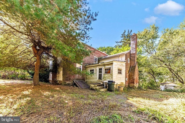6753 Dickerson Rd, Dickerson, MD 20842 - back of property with a chimney