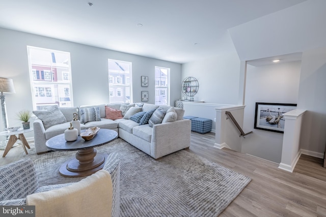 living room with light hardwood / wood-style floors