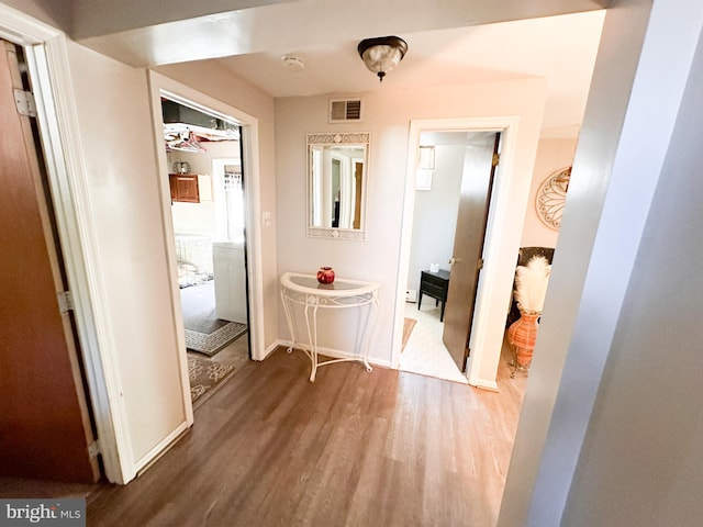 hallway featuring hardwood / wood-style flooring