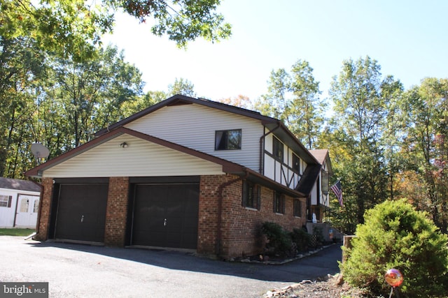 view of property exterior with a garage