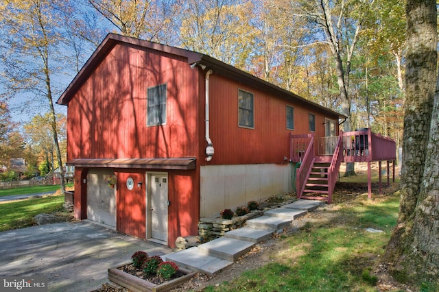 exterior space featuring a wooden deck