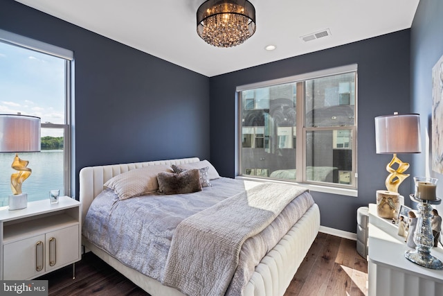 bedroom featuring dark wood-type flooring