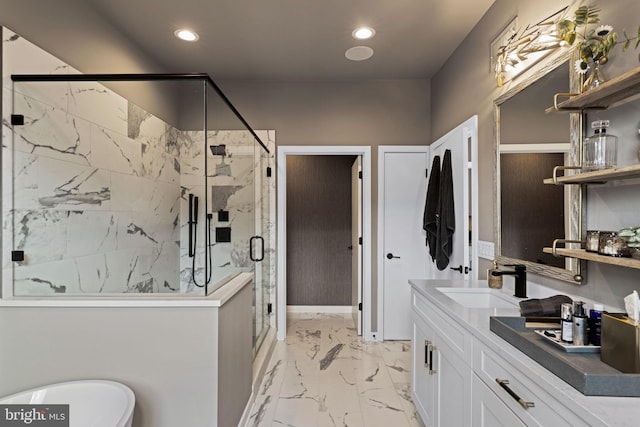 bathroom featuring an enclosed shower and vanity