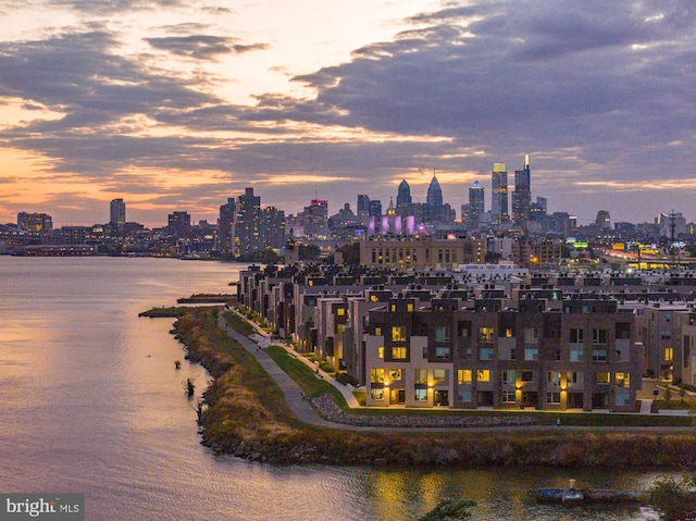 property's view of city featuring a water view