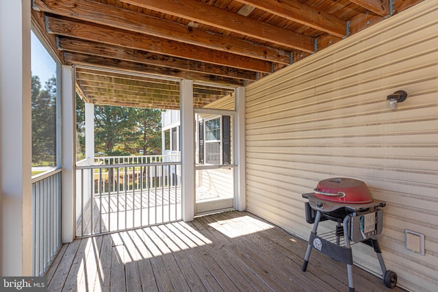 wooden deck with area for grilling