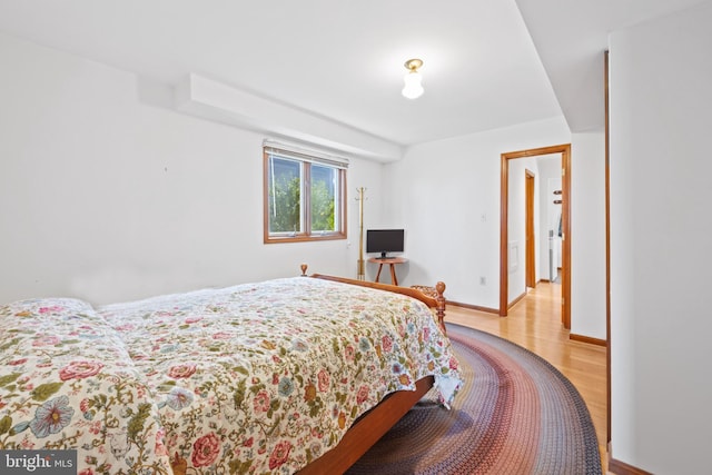 bedroom with light hardwood / wood-style floors