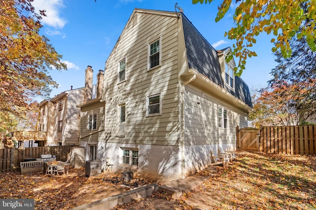 view of side of property featuring cooling unit