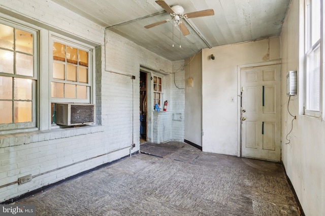 carpeted empty room with cooling unit and ceiling fan