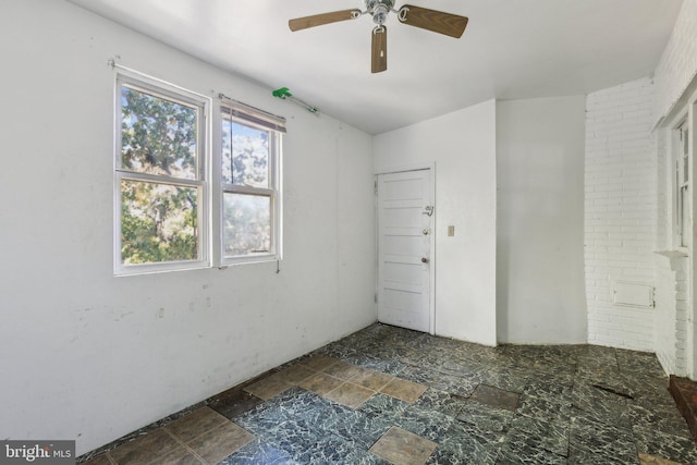 empty room featuring ceiling fan