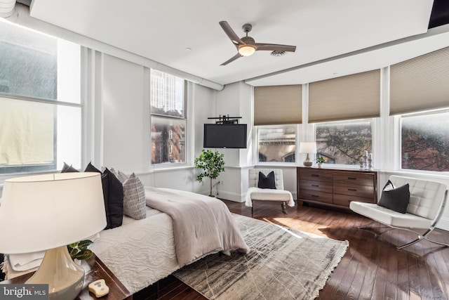 bedroom featuring ceiling fan and wood-type flooring