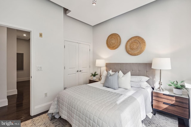 bedroom with hardwood / wood-style floors