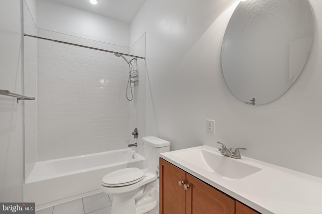 full bathroom with vanity, tiled shower / bath combo, toilet, and tile patterned flooring