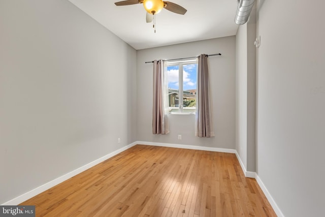 unfurnished room featuring light wood-type flooring and ceiling fan