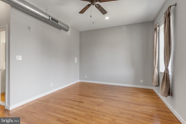 unfurnished room with light hardwood / wood-style flooring and ceiling fan