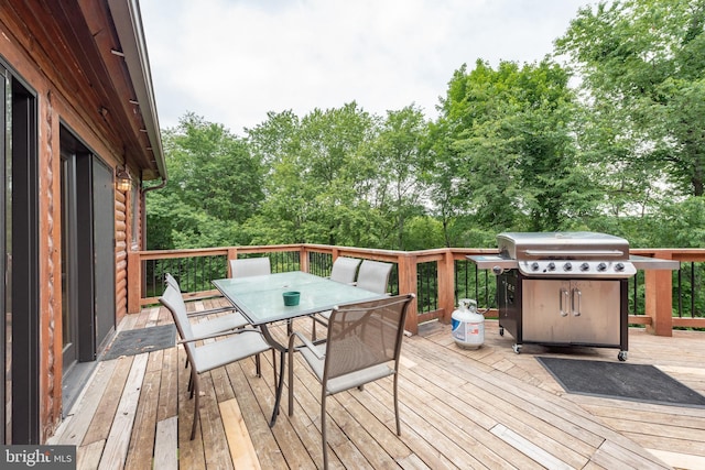 116 Wisp Mountain Rd, Mc Henry, MD 21541 - wooden terrace featuring outdoor dining area and view of wooded area