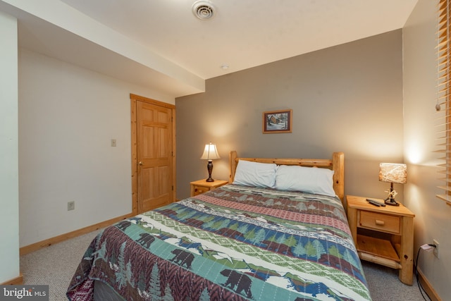 bedroom featuring carpet