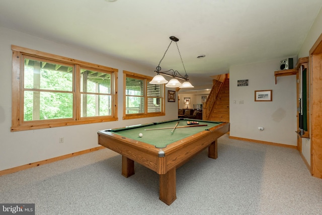 playroom with pool table and light carpet