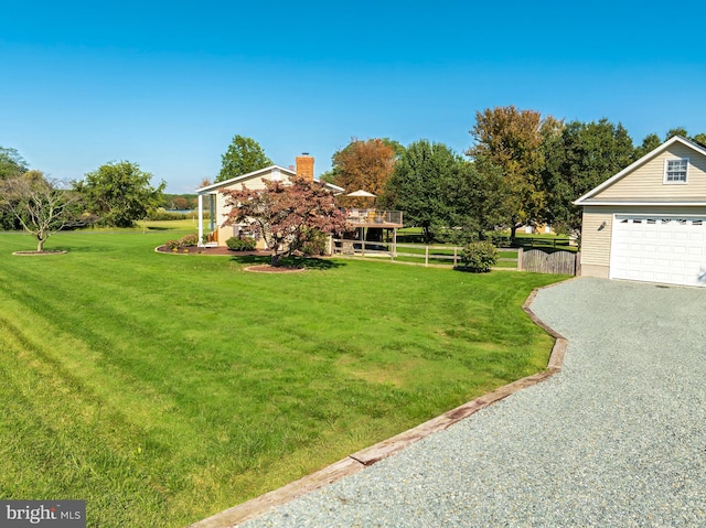 view of yard featuring a garage