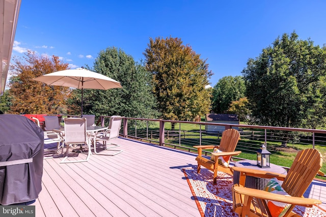 deck featuring a lawn