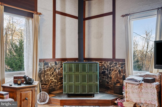 interior details featuring a wood stove