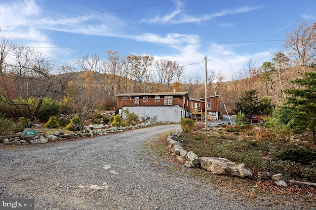 view of front of property with a mountain view