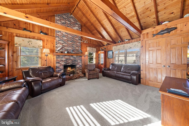 living room featuring wood ceiling, carpet floors, a brick fireplace, wooden walls, and high vaulted ceiling