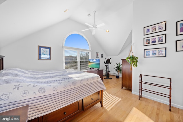 bedroom featuring vaulted ceiling, light hardwood / wood-style flooring, and ceiling fan